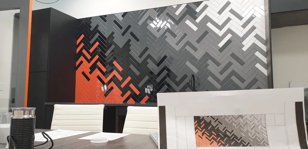 Herringbone pattern backsplash tile installation