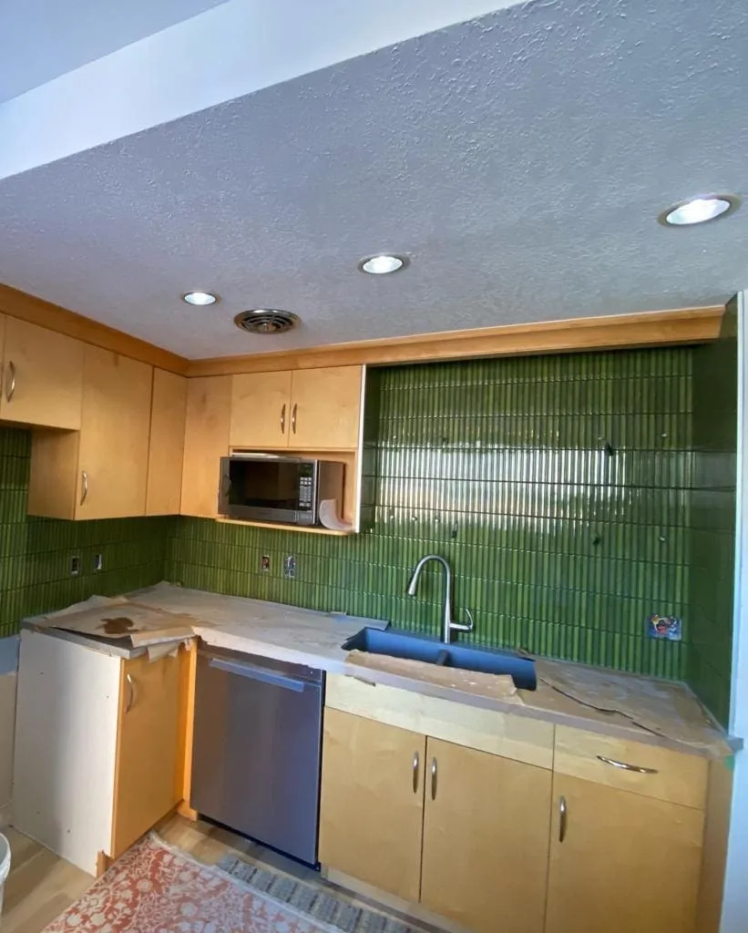 Green kitchen backsplash installed in Calgary